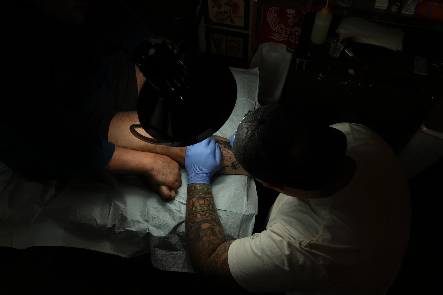 Steadfast Tattoo Parlour artist at work